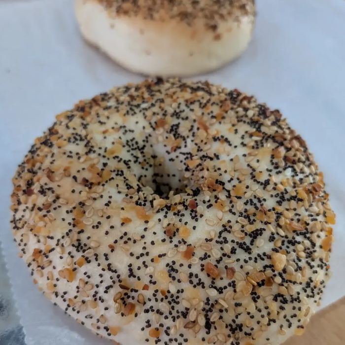 An everything bagel on parchment